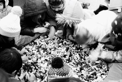 Group of people sitting on floor