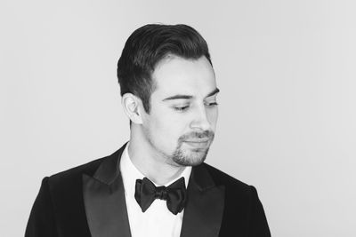 Portrait of man against white background