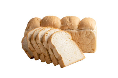 Close-up of bread against white background