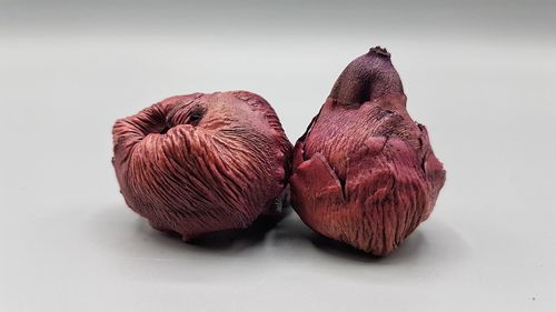 Close-up of fruits against white background