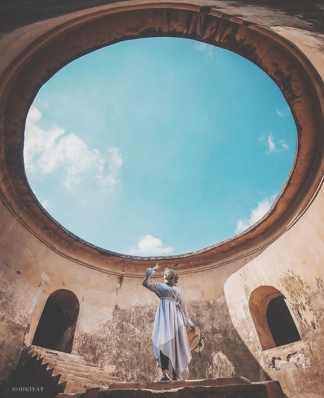 sky, architecture, cloud - sky, built structure, nature, day, no people, low angle view, arch, history, building exterior, the past, outdoors, religion, blue, building, sunlight, belief, human representation, turquoise colored