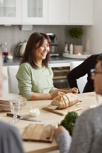 Family sitting at table at home