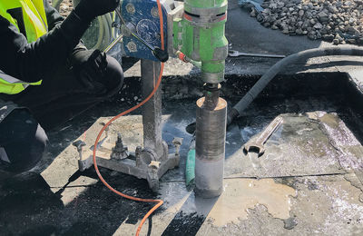 Low section of man working at construction site