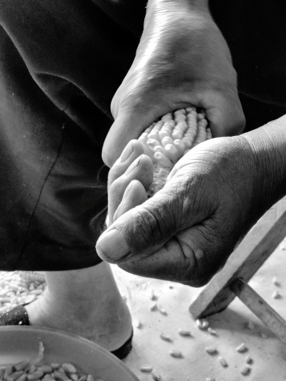 CLOSE-UP OF HANDS HOLDING BABY