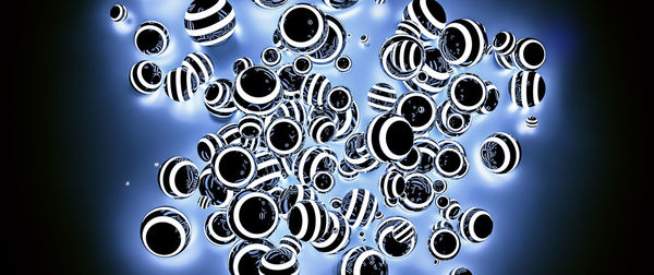 Low angle view of lighting equipment hanging on metal