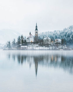 Building against sky during winter