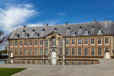 Building against cloudy sky