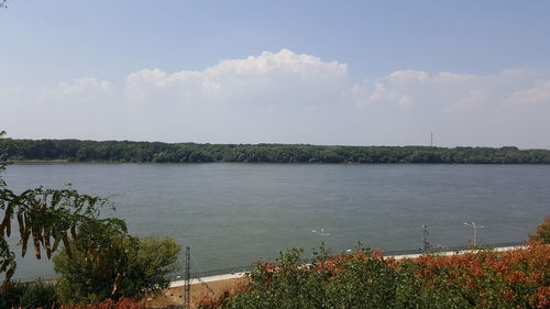 View of lake against cloudy sky