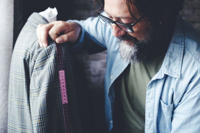 Portrait of man wearing eyeglasses