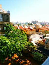 High angle view of houses against clear sky