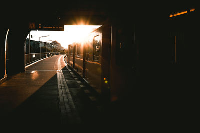 Train in illuminated tunnel