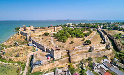 High angle view of historical building against sea