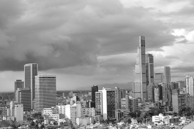 Modern buildings in city against sky