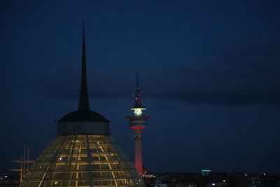 View of communications tower at night