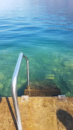 High angle view of swimming pool by sea