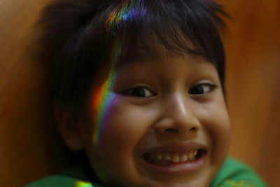 Close-up portrait of smiling boy