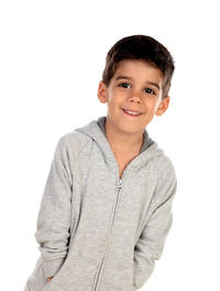 Portrait of smiling boy against white background