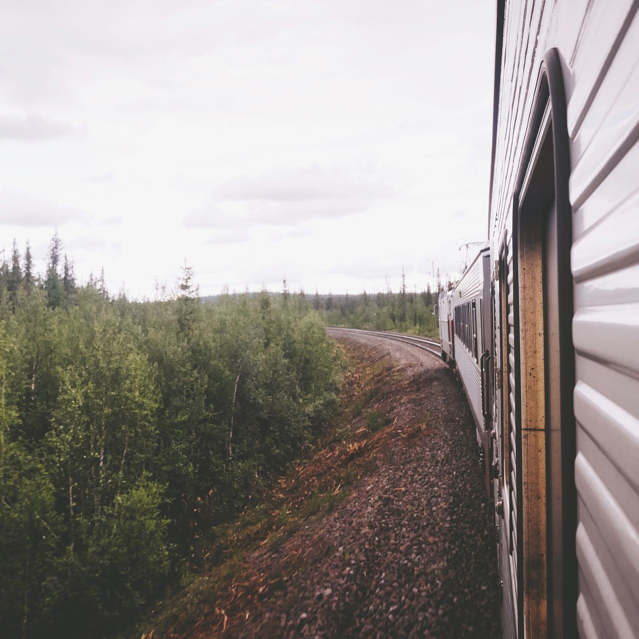 VIEW OF TRAIN ON RAILROAD TRACK