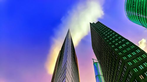 Low angle view of modern buildings against sky