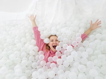 Portrait of happy girl playing