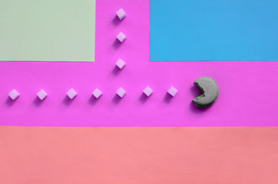 High angle view of multi colored candies on table