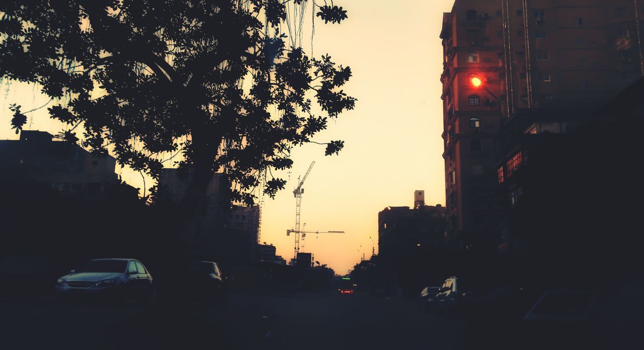 SILHOUETTE OF CAR AT NIGHT