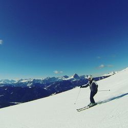 Full length of man standing on mountain