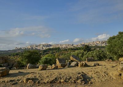 Panoramic shot of trees ruins and buildings against sky