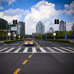 Surface level of road against buildings in city