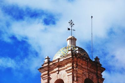 Low angle view of statue against sky