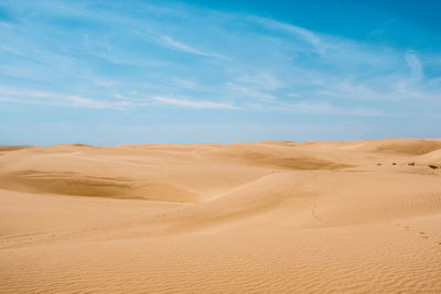 Scenic view of desert against sky