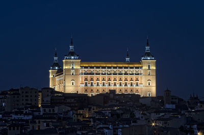 Low angle view of clock tower in city