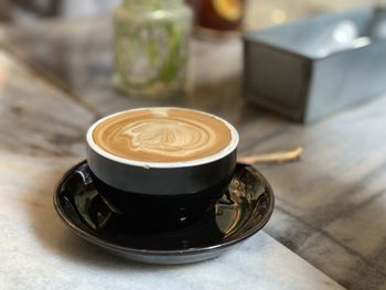 Coffee cup on table