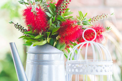 Close-up of red roses in vase