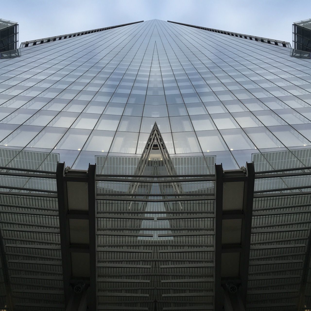 LOW ANGLE VIEW OF MODERN BUILDINGS AGAINST SKY