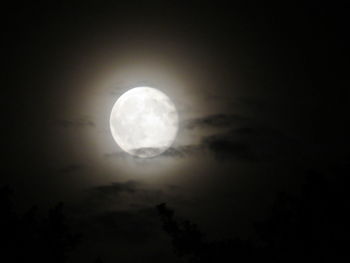 Low angle view of moon against sky at night