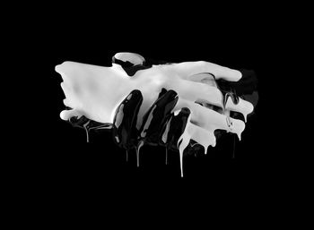 Close-up of ice cream against black background