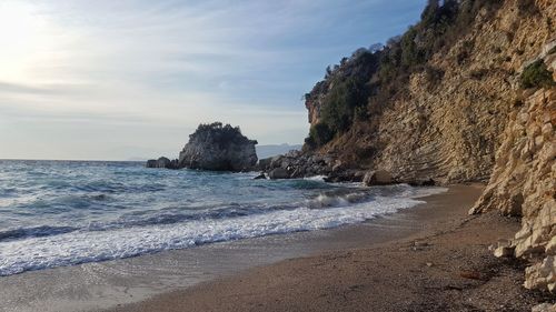 Scenic view of beach against sky