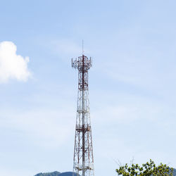 Low angle view of communications tower against sky