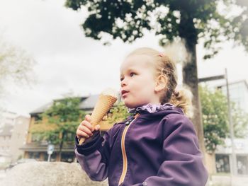 Girl holding ice cream