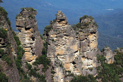 Scenic view of cliff against sky