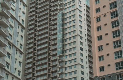 Low angle view of modern buildings in city