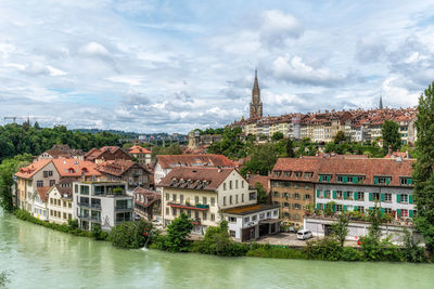 Buildings in city against sky