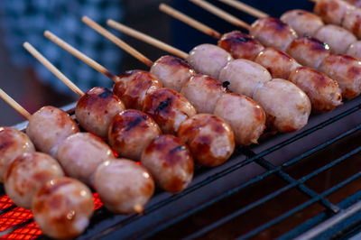 High angle view of meat on barbecue