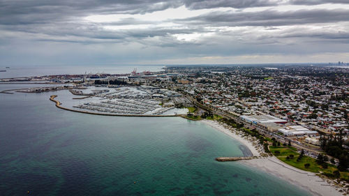 High angle view of city and buildings against sky