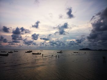 Scenic view of beach against sky during sunset