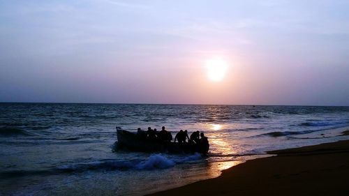 Scenic view of sea at sunset