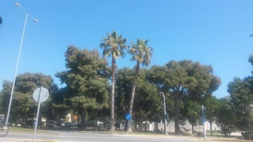 View of road against clear blue sky