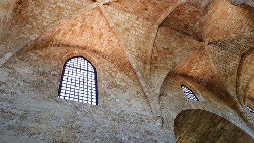 Low angle view of ceiling of historic building