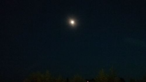 Scenic view of moon against clear sky at night